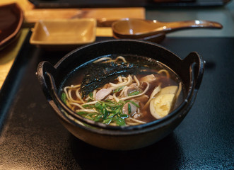 A plate of soup at a Japanese restaurant