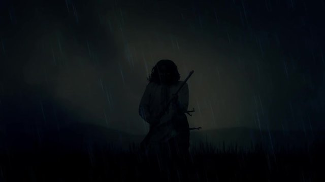 An Epic Native American Warrior Kneeling in an Open Field Under a Storm