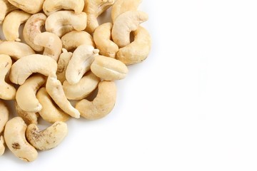Fototapeta premium Natural Cashew Nuts on White Background