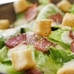 salad with bacon, cheese and dressing