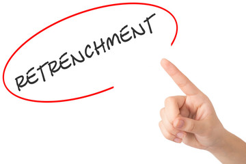 Hand of a young girl points to a word