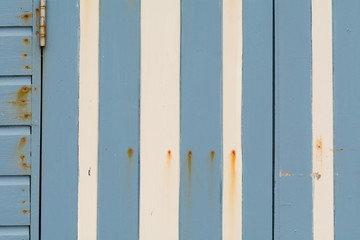 Blue and white striped beach hut