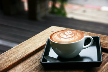 latte art on wooden table 02