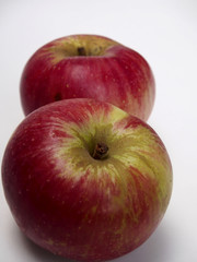 Two isolated akane apple