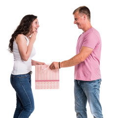 Happy couple with shopping bag