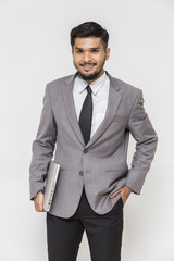 Businessman holding a laptop go working,lifestyle