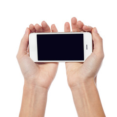 Female hands holding new cell phone