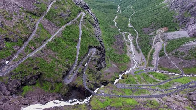 Troll's Path Trollstigen or Trollstigveien winding mountain road in Norway. Aerial footage