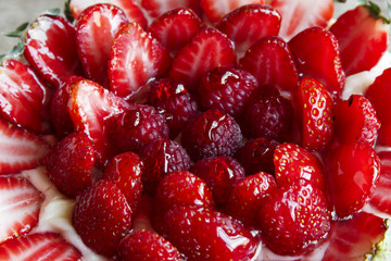 meringue cake with custard and strawberry raspberry