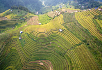 Aerial view of Rice fields on terraced of Mu Cang Chai, YenBai, Vietnam. Rice fields prepare the harvest at Northwest Vietnam.Vietnam landscapes.