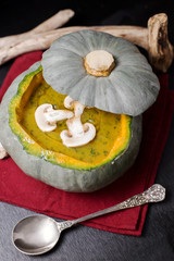 top view of autumnal soup with pumpkin and mushroom