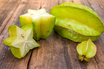 Star fruit on wood background ,starfruit on wooden background  