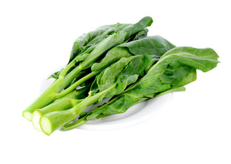 Chinese kale vegetable in white  plate on white background