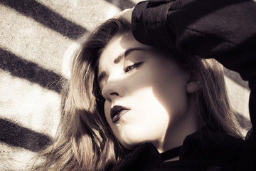 Portrait in profile of a beautiful teenage girl