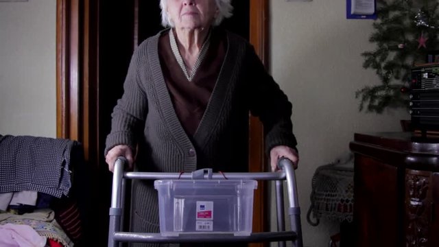 99 Years Woman With Walker Turning Up The Radio Volume, Tilt Down