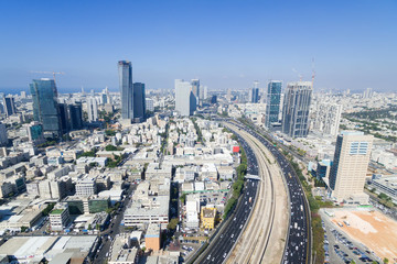 Naklejka na ściany i meble Tel Aviv skyline - Aerial photo of Tel Aviv's center with Ayalon freeway 