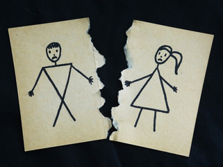 man and woman drawing torn apart