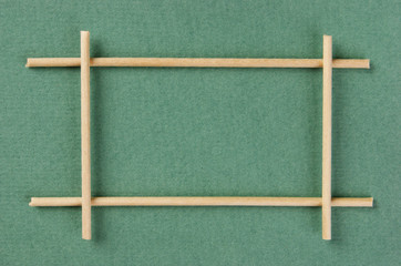 wooden frame on the green background