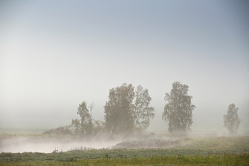 October autumn fields and meadows. Fog on the river