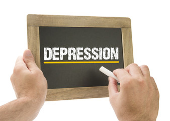 Depression - Hand schreibt auf Kreidetafel