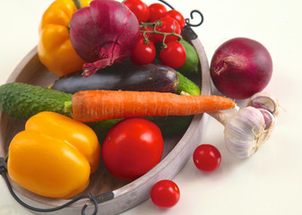Fresh autumn vegetables on a white background