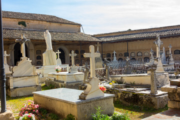 old cemetery with beautiful sculptures and crosses