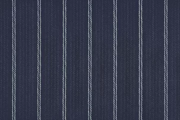 Tuinposter Stof Close up of pinstriped fabric texture background.Detail of navy blue wool suiting with twin white pinstriped