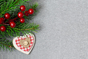 Christmas background with wooden heart ornament