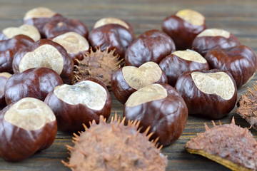 Chestnuts on wooden background