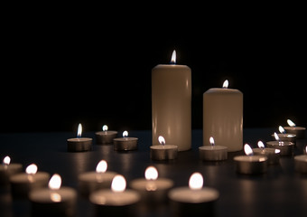 Candle lights, Christmas candles burning at night. Abstract candles background. 