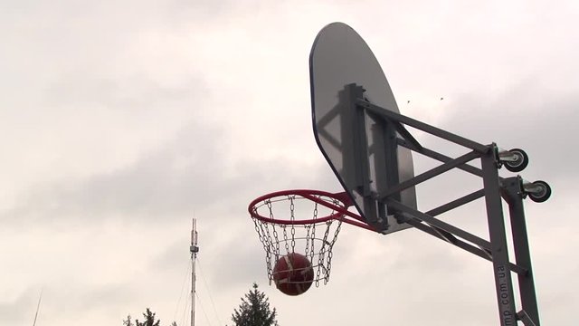 The basket ball flies