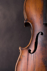 Old broken violin close up