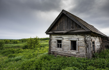 Dilapidated old village house in Russia