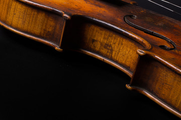 Old broken violin close up