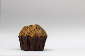 banana cake in paper cup on white background
