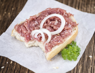 Bun with Mett (German cuisine; selective focus)