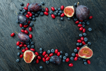 frame with berries and figs