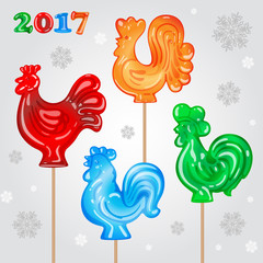 Roosters in the form of lollipops