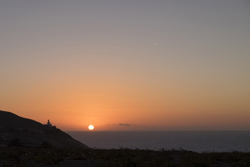 Fototapeta premium Santorini lighthouse sunset