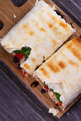 Chicken, Black Beans, Spinach and Tomato Burritos. View From Above, Top Studio Shot