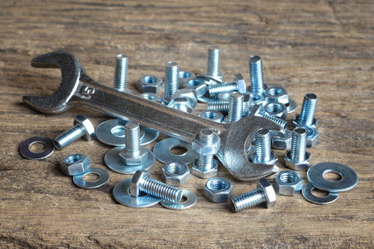 wrench on nuts and bolts