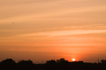 Fototapeta na wymiar sunset sky with the sun