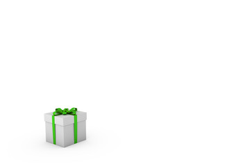 White gift box with green ribbon bow