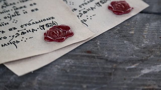 Antique letters with official heraldic stamps. Two ancient manuscripts. Old papers lies on the table