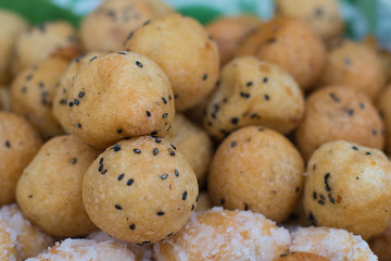 Deep fried dough ball with black Sesame Seedsfilling or Kanom Kai Hong (Thai Dessert)