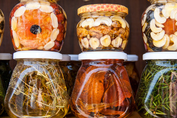 Homemade honey with dried fruits and nuts on the market