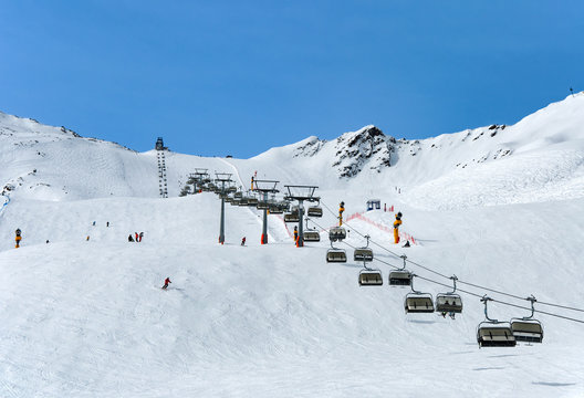 Skiers and chairlift in Solden, Austria