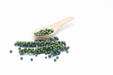 Green peppercorns isolated on a white background