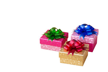 Obraz premium colored gift boxes with colored bows on isolated white backgroun