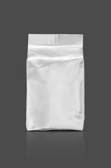 blank packaging foil pouch isolated on gray background